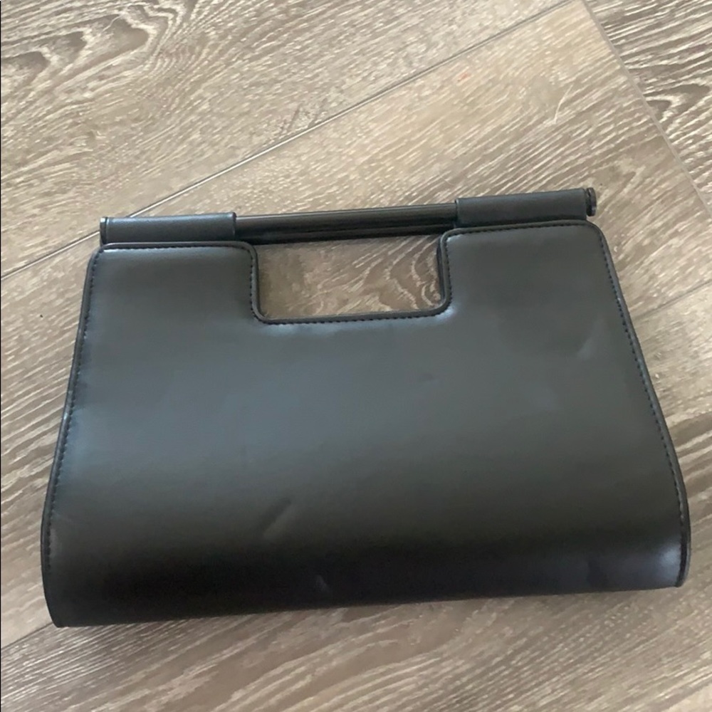 Charming Charlie’s black clutch